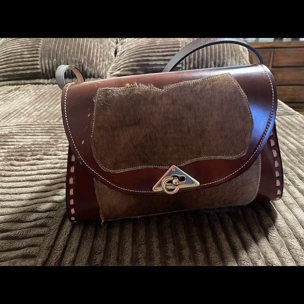 Hand made bag. Brown with real fur. It can be used many different ways.
